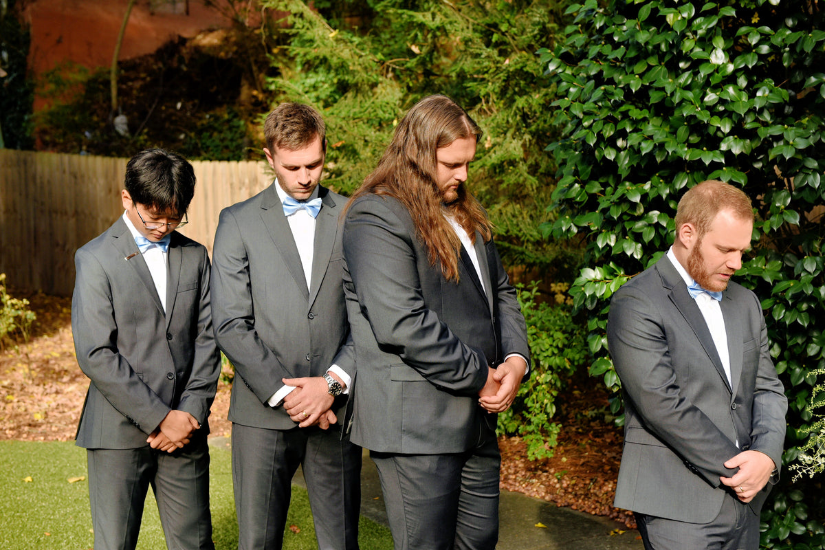 Austin and his groomsmen during the outdoor wedding ceremony.